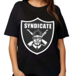 Coco Wearing The Rhyme Syndicate Shirt