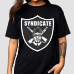 Coco Wearing The Rhyme Syndicate Shirt