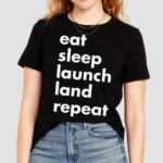 Jen Crowley Wearing Eat Sleep Launch Land Repeat Shirt