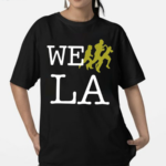 Popout Wearing We Run La Shirt