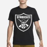 Coco Wearing The Rhyme Syndicate Shirt