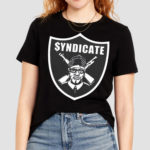 Coco Wearing The Rhyme Syndicate Shirt