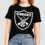 Coco Wearing The Rhyme Syndicate Shirt